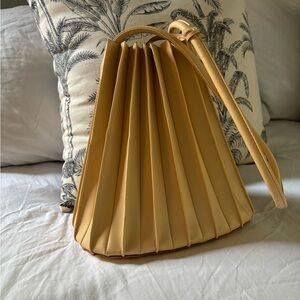 Pleated style bag. Super cool and unique. Color of the season. 💛
